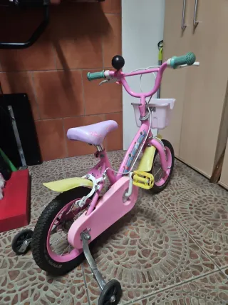 Bicicleta infantil rosa sin ruedin