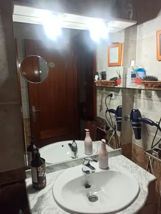 Mueble de baño mármol y madera