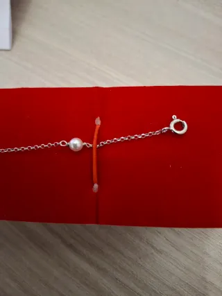 Bracciale Histoire d'Or perle e quadrifoglio