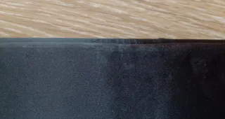 Bolso de mano negro con pedrería