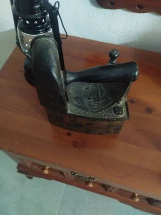 Plancha de carbón antigua