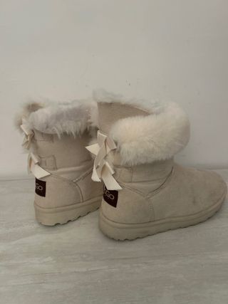 Botas peludas beige