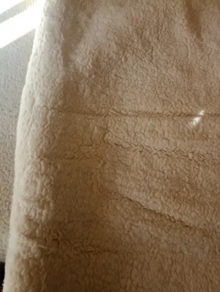 Coprimaterasso matrimoniale in lana Merinos.