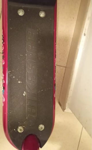 Patinete estilo bici rosa y azul