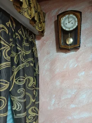 Reloj de péndulo musical