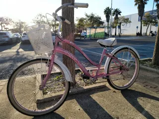 Bicicleta rosa paseo con cesta