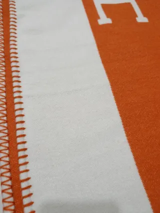 Manta Fleece Naranja y Blanca