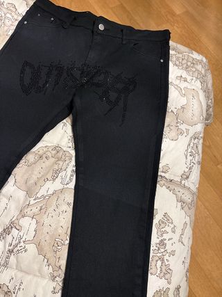 Jeans skinny neri con brillantini