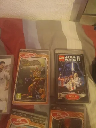 PSP + 11 Juegos cargador no tengo