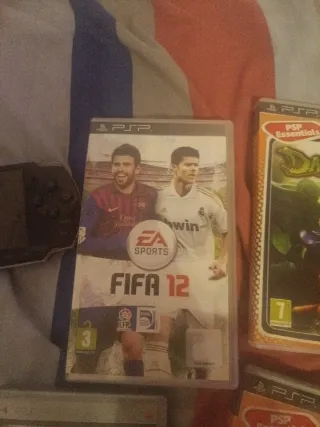 PSP + 11 Juegos cargador no tengo