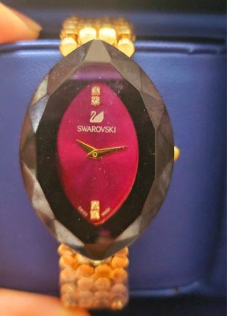 Reloj Swarovski Dorado y Morado