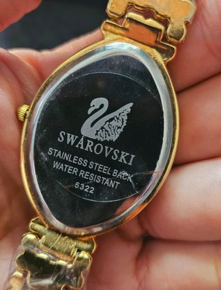 Reloj Swarovski Dorado y Morado