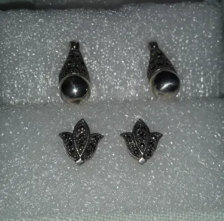 2 anillos y 2 pendientes de plata