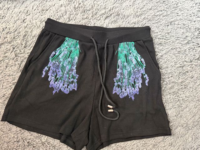 Shorts Loewe Negro con Flores Moradas