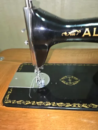 Máquina de coser Alfa manual