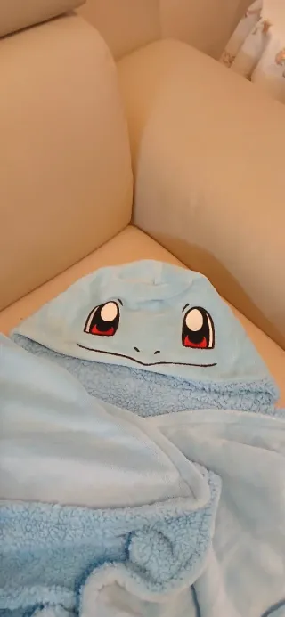 Coperta con cappuccio azzurra