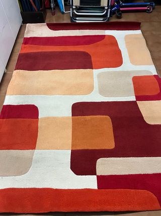 Alfombra salón poliéster naranja y rojo