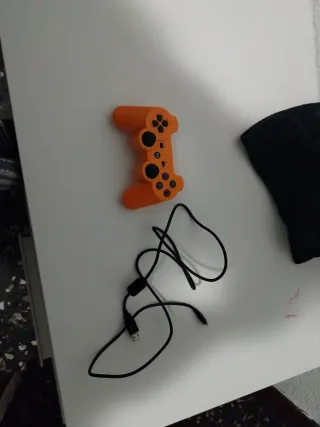 Mando PS3 Naranja + Cable Carga+2 juegos