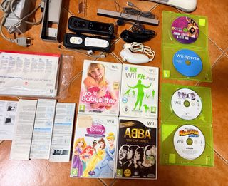 Nintendo Wii + Wii Fit + Giochi
