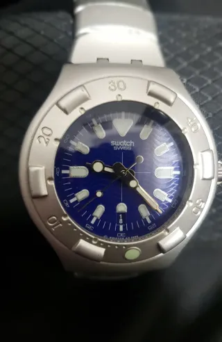 Reloj Swatch Azul y Plateado