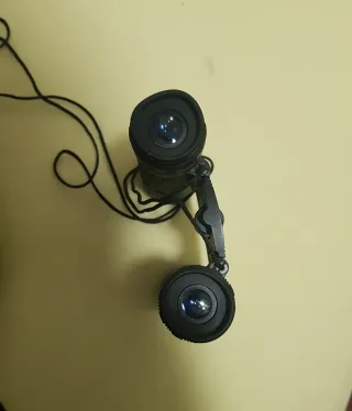 Prismáticos MINOX 10x25 Campo 5.8º