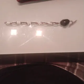 Conjunto de 2pulseras plateadas acero y un collar