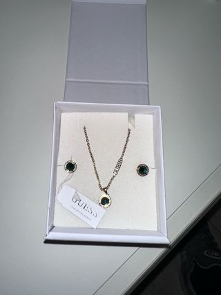 Coppia orecchini e collana Guess oro verde