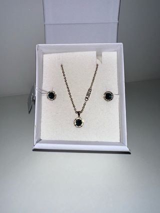 Coppia orecchini e collana Guess oro verde