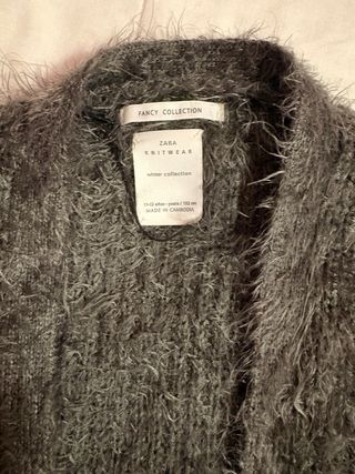 Chaqueta de punto peluda gris