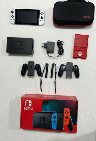 Nintendo Switch Blanca y Negra + Accesorios