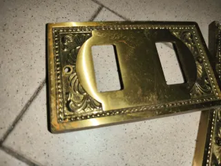 Placche copri interruttori decorative