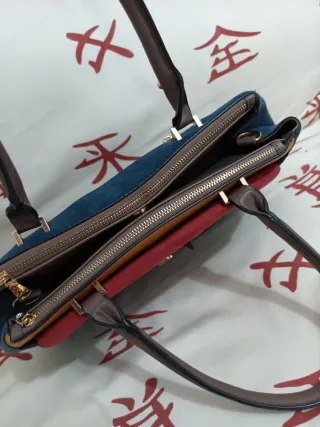 Bolso azul, mostaza y rojizo