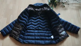 Plumas Geographical Norway azul mujer