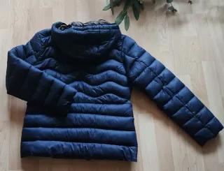 Plumas Geographical Norway azul mujer