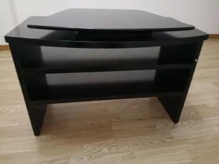 Mueble TV negro curvo