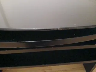 Mueble TV negro curvo