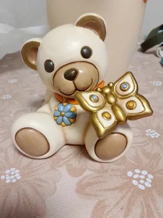 Orsetto Thun con farfalla e fiore