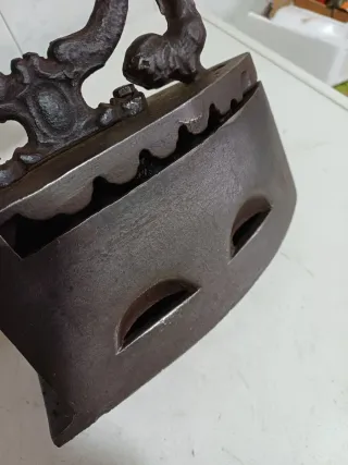 Plancha antigua de carbón