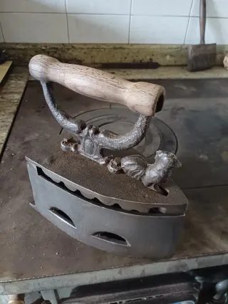 Plancha antigua de carbón