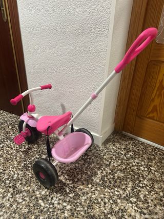 Triciclo niña rosa con empujador