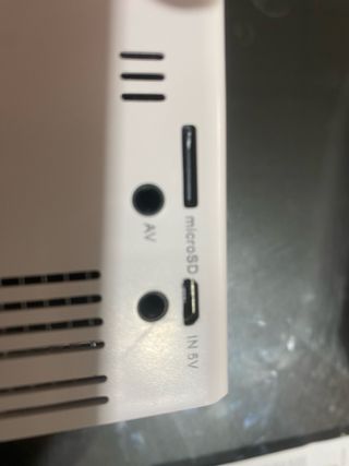 Mini proyector LED + pantalla