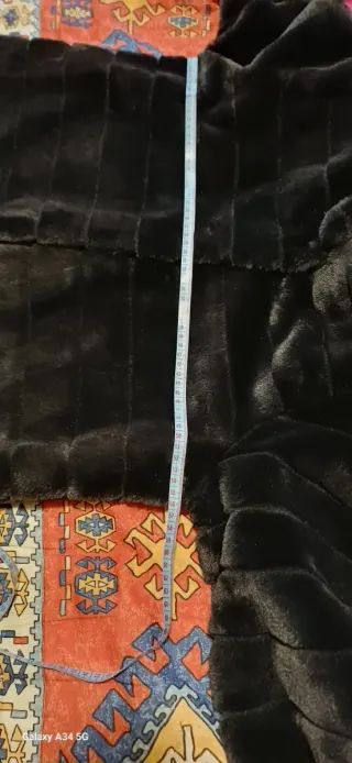 Abrigo de pelo negro