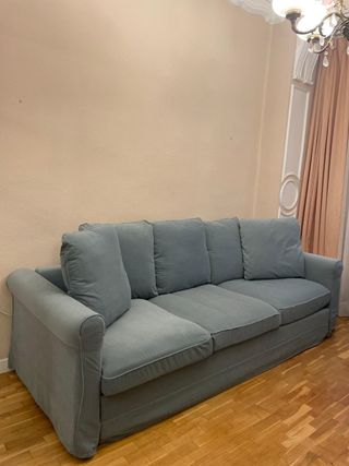 Sofá de tela azul y gris de 4 puestos