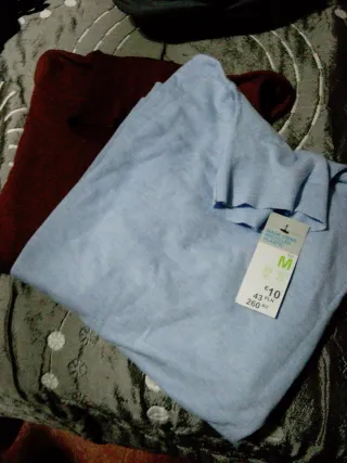 Jersey cuello alto talla M pero da mas talla