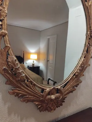 Espejo antiguo dorado ovalado