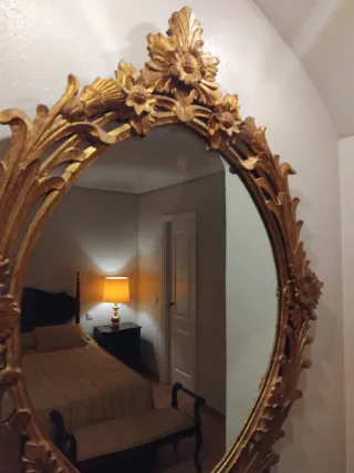 Espejo antiguo dorado ovalado