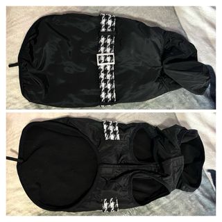 Chaqueta negra con cinturón para mascota.