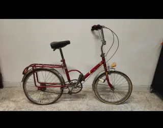Bicicleta plegable granate antigua