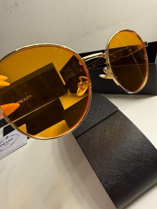 Occhiali da sole Prada oro e arancio