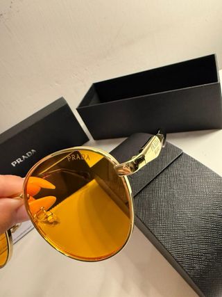 Occhiali da sole Prada oro e arancio